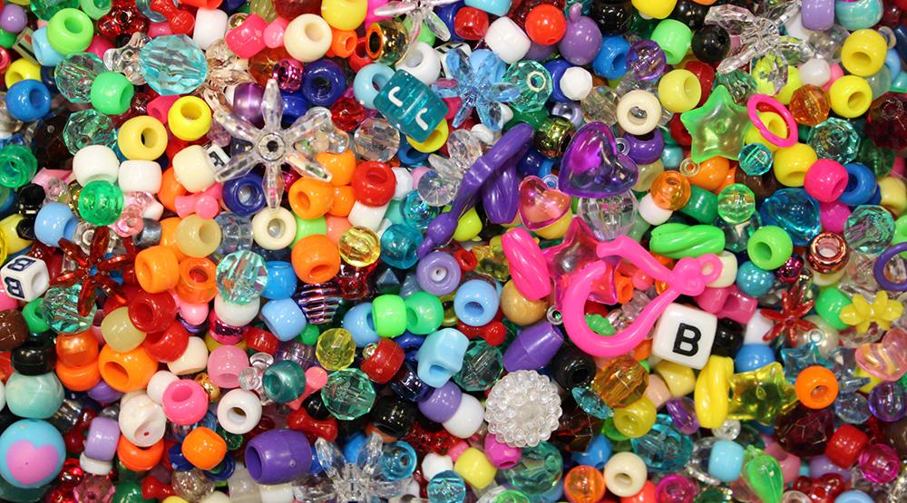 Many shapes, colors, and variable sized beads are seen in this image of one of the bins in the Pittsburgh Center for Creative Reuse. Photo by Christiana M. Beatrice.