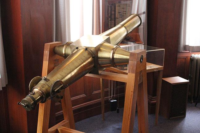 A telescope used in the early years of the observatory sits in the lecture room. Photo by Steven Hocker