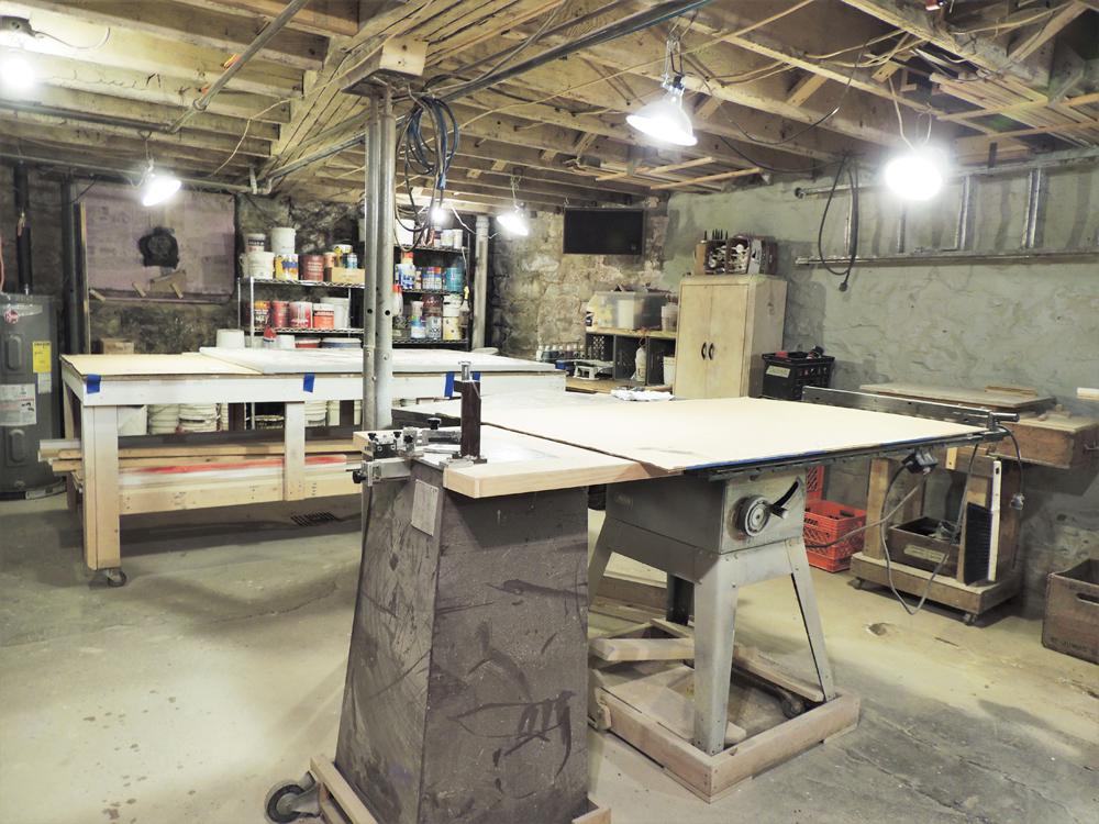 The framing workshop in the basement of Boxheart Gallery. Photo by Lauren Chronister.