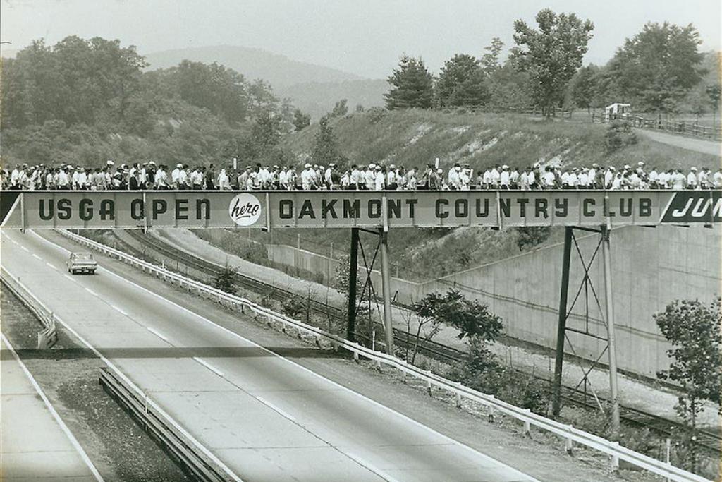 fans walk over Oakmont Country Club bridge; USGA archives 1962